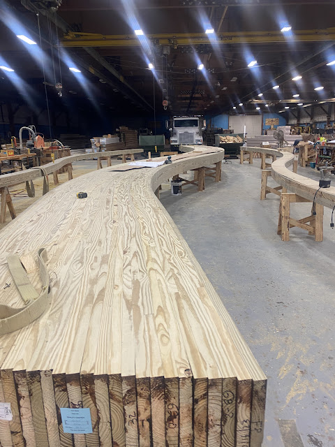 Curved Glulam beams being produced.