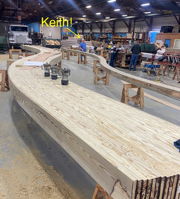 Curved Glulam beams with Keith in the background