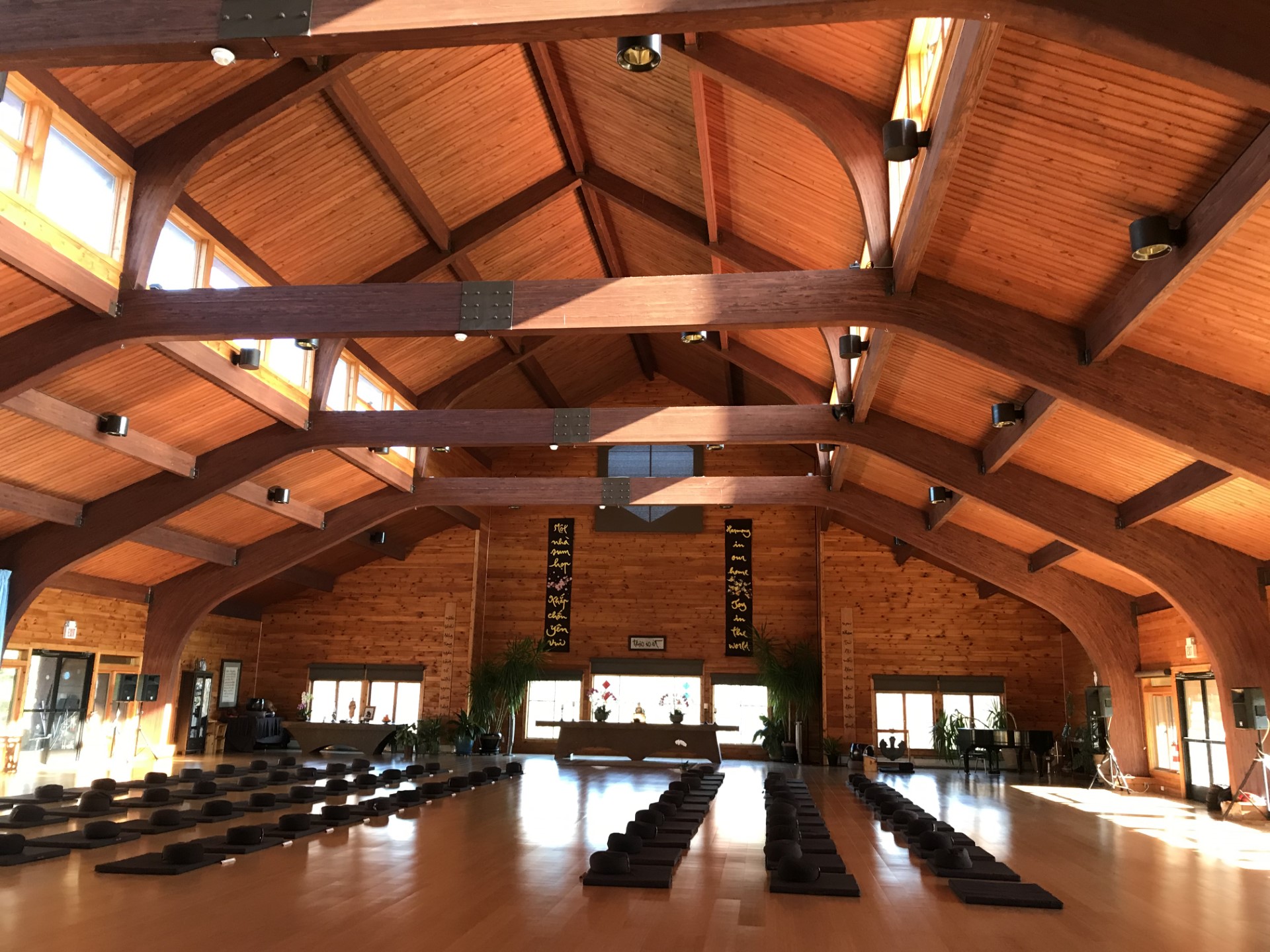 Interior view of a space featuring Unalam wood laminate construction beams.